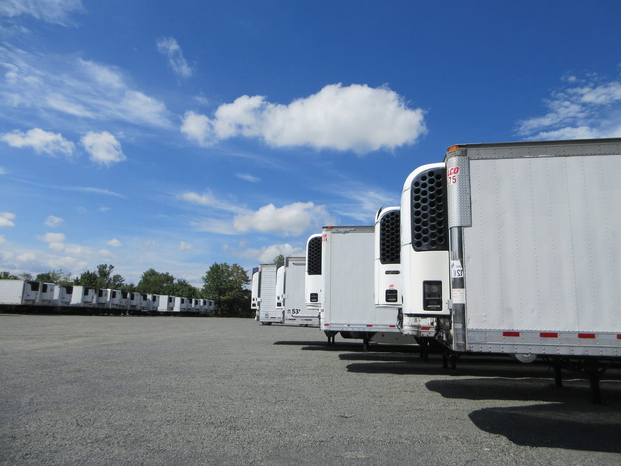 A row of Jilco refrigerated trailers of differing sizes lined up at the New Jersey yard.